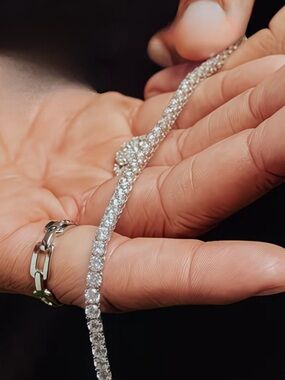 Sterling silver tennis bracelet set, 4mm wide with a row of moissanite stones
